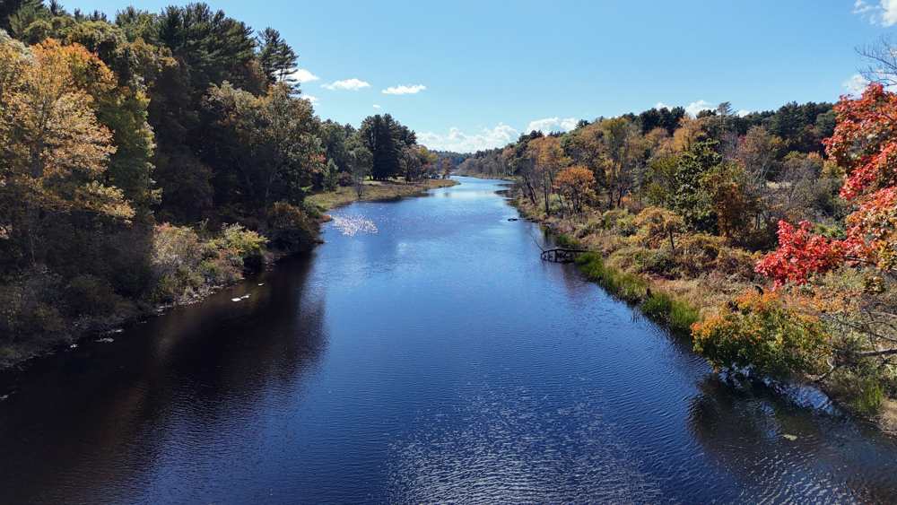 The Charles River seen from the Bridge Street bridge in fall