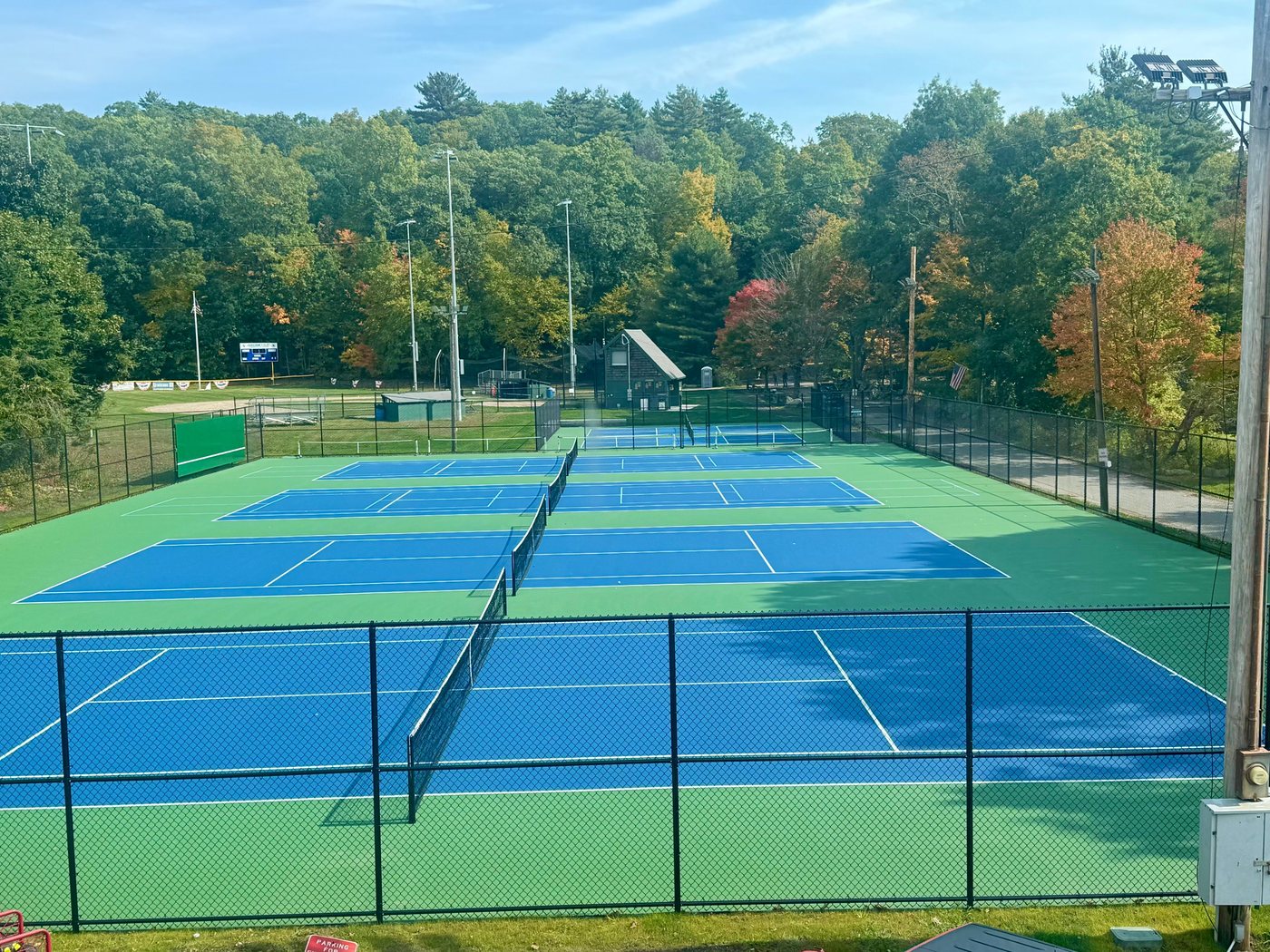 The tennis and pickleball courts from above, with Jameson Field 1 in the background